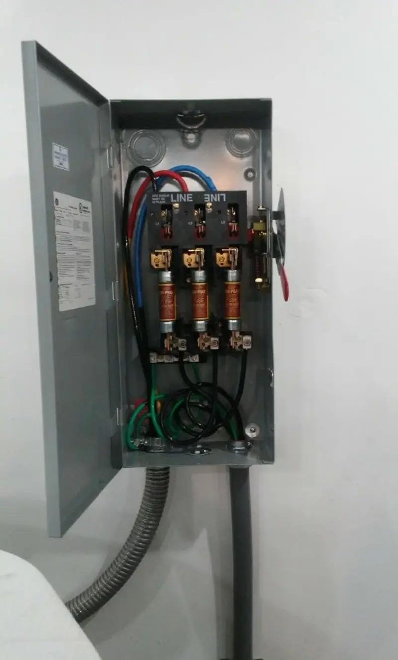 Three-phase disconnect switch installed for Smoke Detector Installation in Turner